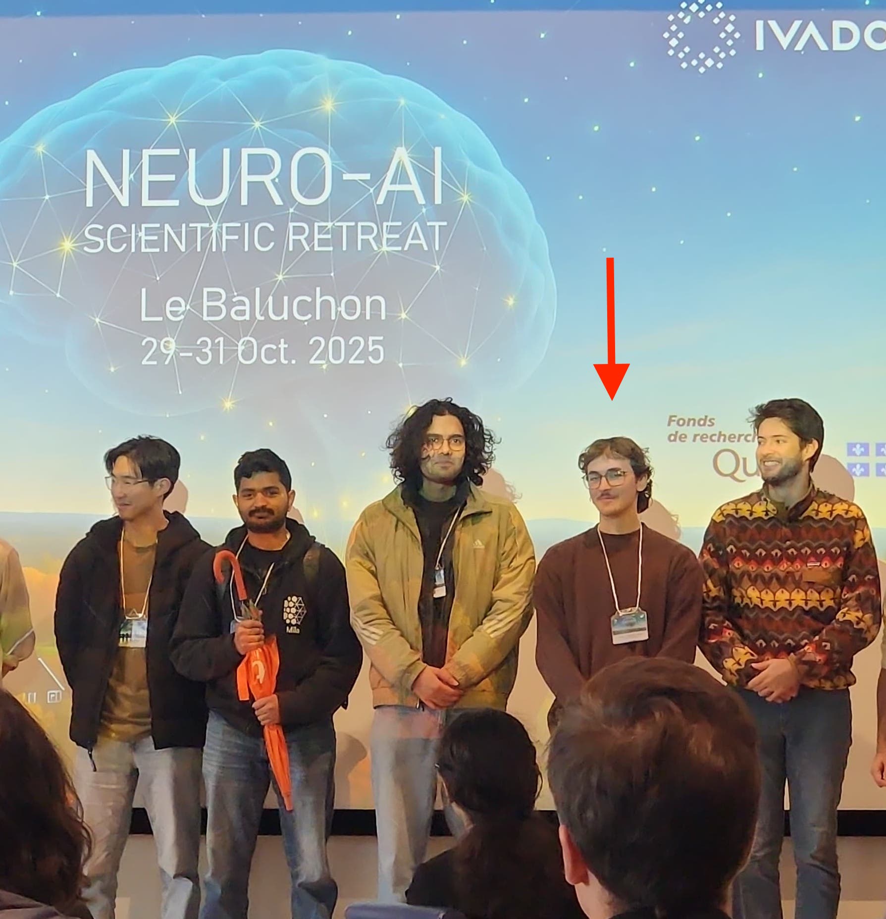 I am the tallest one with glasses